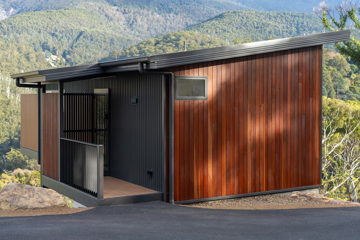 Ironbark hillside cabin showing entry overlooking the view