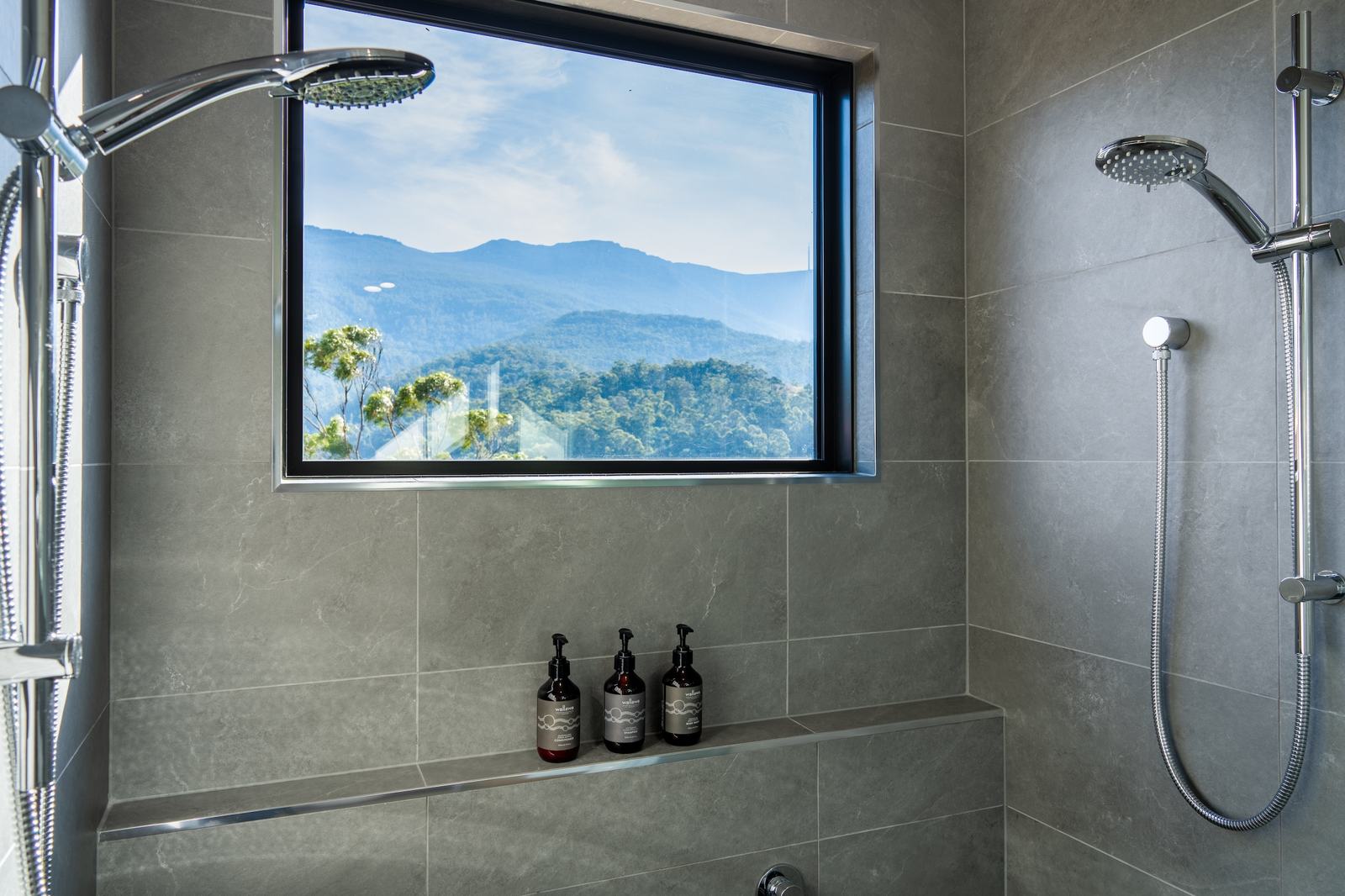 Double shower overlooking kunanyi mt wellington in stillwater cabin